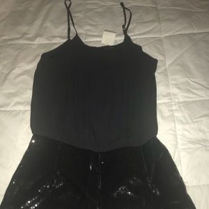 Black sleeveless jumper